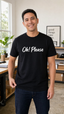 Oh! Please black graphic tee worn by male model in office setting